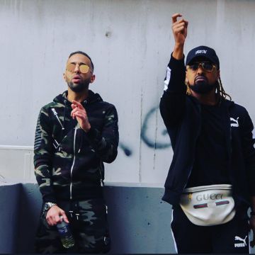 La casquette de l'album 100% portée par Alonzo sur un post Instagram de Naps
