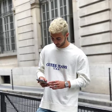 El jersey asap Rocky USA beige y azul marino que lleva So_style en su cuenta de Instagram