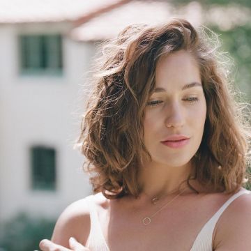 One of the necklaces solitaire pendant by Lola Kirke on his account Instagram