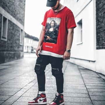 The sneakers black and red Nike Air Jordan 1 Retro "homage To" Home of the influencer Niklas Woyt on his Instagram (@ezcape)