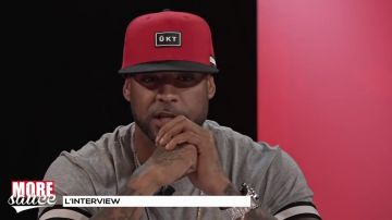 La casquette rouge Unkut que porte Booba dans son interview #MoreSauce avec Mehdi Maizi