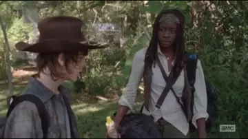 The felt hat brown Carl Grimes (Chandler Riggs) in The Walking Dead S04E11