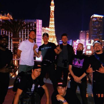 Eyeglasses round metal Giorgio Armani worn by Logic in front of the Eiffel Tower on Instagram