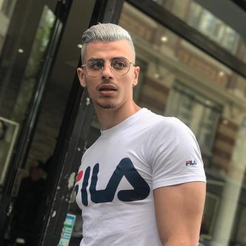Le T-Shirt FILA blanc logo porté par Prime (@primetimefut) sur instagram (laboutiqueofficielle)
