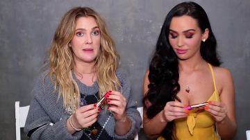 The red lip Matte Lip Duo Flower used by Carli Bybel on Drew Barrymore in her youtube videos "I did Drew Barrymore's Makeup! OMG!"be