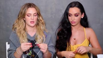 The gloss metalic liquid Flower used by Carli Bybel on Drew Barrymore in her youtube videos "I did Drew Barrymore's Makeup! OMG!"