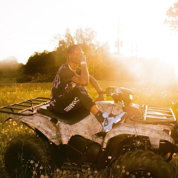 Light blue Travis Scott x Nike Air Jordan 4 “Cactus Jack” sneakers worn by Travis Scott on his Instagram account