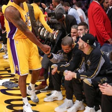 White sneakers Nike Air Jordan 12 Retro  "ovo" worn by Drake on Brkicks's Instagram account