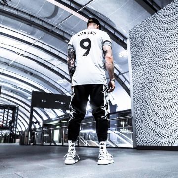 The white socks Kappa with a repeating pattern that is on the influencer nokiibah on his instagram