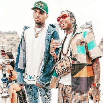 The green cap is a 3-star al-amiri view the account Instagram of Chris Brown