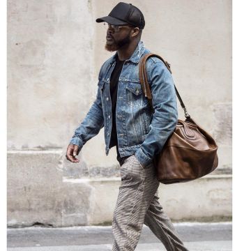 Vest denim by Balenciaga worn by "- Dosseh in the video " KFC "