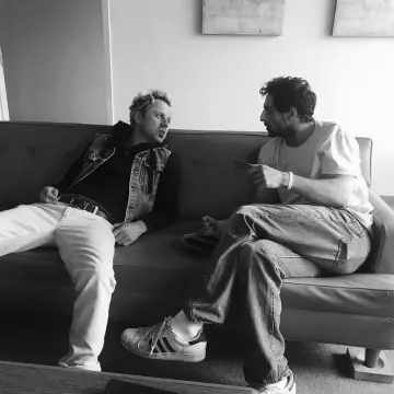 White shoes Adidas Superstar worn by Aaron Taylor-Johnson on his account Instagram