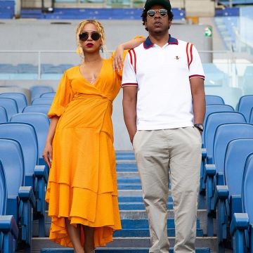 Ganni yellow dress worn by Beyoncé at Rome Stadium in Italy