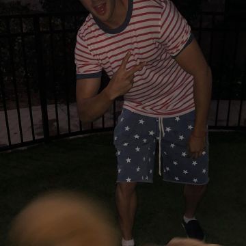 The t-shirt with red stripes worn by Steven R. Mcqueen on his account Instagram