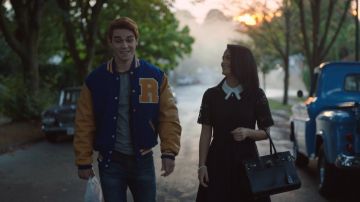 The black dress Dixxy by Ted Baker with sleeves lace and peter pan collar worn by Veronica Lodge (Camila Mendes) in Riverdale S01E02
