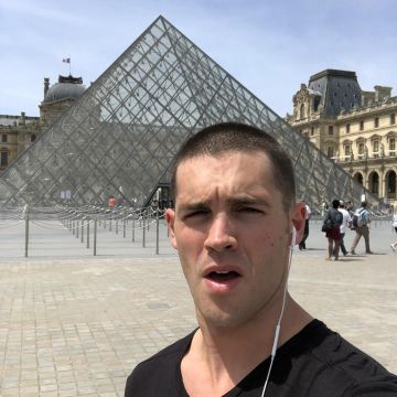 The black t-shirt, V-neck collar worn by Steven R. Mcqueen on his account Instagram