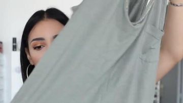 Le débardeur kaki Etam dans sa video YouTube ENORMES SOLDES POUR TOUS LES STYLES + ESSAYAGES !