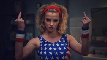 Liberty Belle / Debbie Eagan's USA color wristbands (Betty Gilpin) in GLOW
