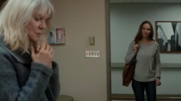 The gray sweater end to the round collar worn by Bridget Ertz (Hilary Swank) in What They Had