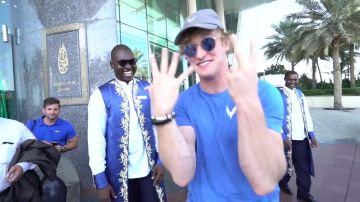 The t-shirt blue Maverick Logan Paul in his video "Trapped in a cage with giant sharks"