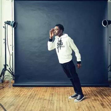 The Sneakers Converse All Star Hi black worn by Caleb Mclaughlin on his account Instagram