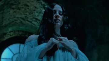 The ring of purple-Lucille Sharpe (Jessica Chastain) in the movie Crimson Peak