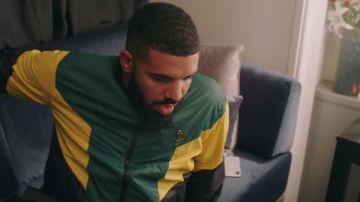 The jacket the October's Very Own green, yellow, and black worn by Drake in her video clip for "In My Feelings"