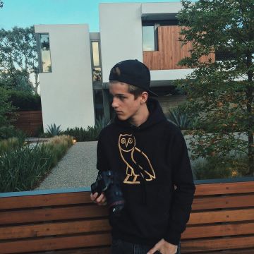 Sweatshirt hoody black OVO Owl Hoodie Drake worn by Alex Lange on his account Instagram