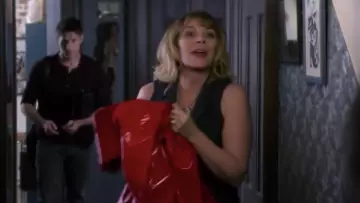 The waxed brilliant red Colleen (Kim Cattrall) in Tell Me a Story