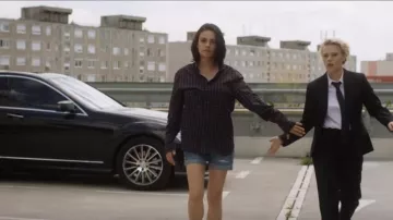 The plaid shirt man door Audrey (Mila Kunis) in " The Spy Who Dumped Me