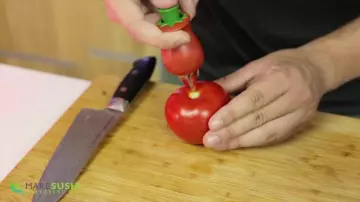 Tomato huller seen in the video "8 Innovative Kitchen Gadgets" by Davy Devaux on his channel How To Make Sushi