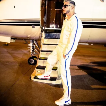 The tracksuit, with white stripes worn by DJ Snake on his account Instagram
