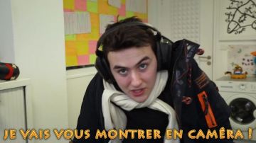 The parka black and orange superdry worn by Hugo Posay in his video "1kill = 1vêtement more"