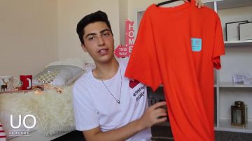 Orange T-shirt Urban Outfitters seen on a Youtube video of Alex Tamburini