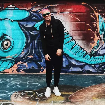 Sneakers Adidas Yeezy Boost 350 V2 "cream"  worn by Bad Bunny on his Instagram account