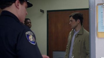 The bomber jacket beige Ralph Lauren of Dean Karny (Taron Egerton) in Billionaire Boys Club