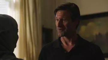 The polo black by Greg (Aaron Eckhart) in The Romanoffs