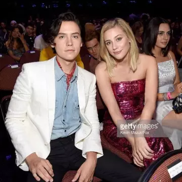 Cole Sprouse white tuxedo jacket at Teen Choice Awards 2018