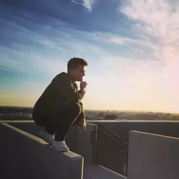 The Sneakers Converse All Star Hi worn by Charlie Puth on his account Instagram