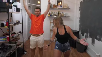 The brown belt worn by Peter Croce in his youtube video "You guess the price or you the doors"