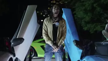 La veste beige Louis Vuitton portée par Quavo dans son clip Lamb Talk