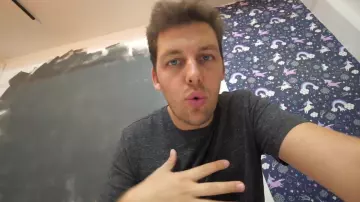 The black t-shirt worn by Peter Croce in his video "Hunting Pokémon by rugby players"