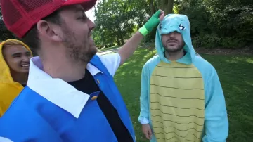 The blue jacket worn by Peter Croca in his video "Shoe horn Pokémon with rugby players"