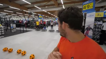 The football balls orange used in the video "all alone in a decathlon" of Peter Croce