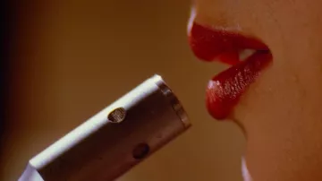 The red lips of Mrs. Mia Wallace (Uma Thurman) in Pulp Fiction