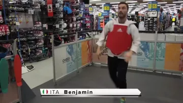 protection adidas red view in the video "all alone in a decathlon" of Peter Croce