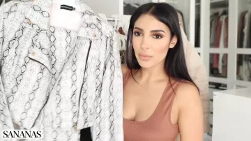 The jacket in faux leather python print Pretty Little Thing in the YouTube video STUFF AND HAUL : I robbed PrettyLittleThing ! of Sananas