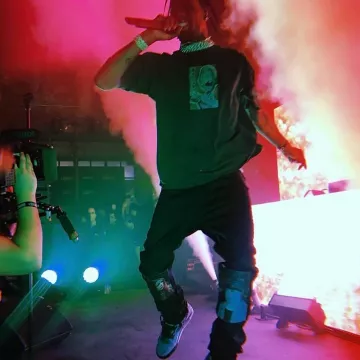 Nike Air Jordan 4 Retro "Cactus Jack" sneakers worn by Travis Scott on @slamkicks Instagram account