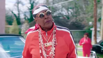 The jacket Gucci orange in the clip Proud of 2 Chainz ft. YG, Offset