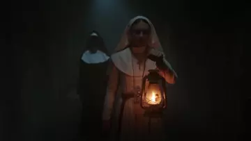 The holding of the good sister of The Nun (Bonnie Aarons) in The Nun